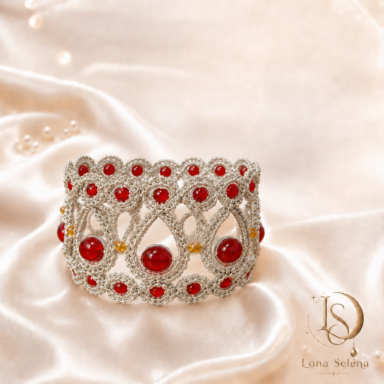 Handmade Lona Selena bracelet with deep red stones and silver crochet detail