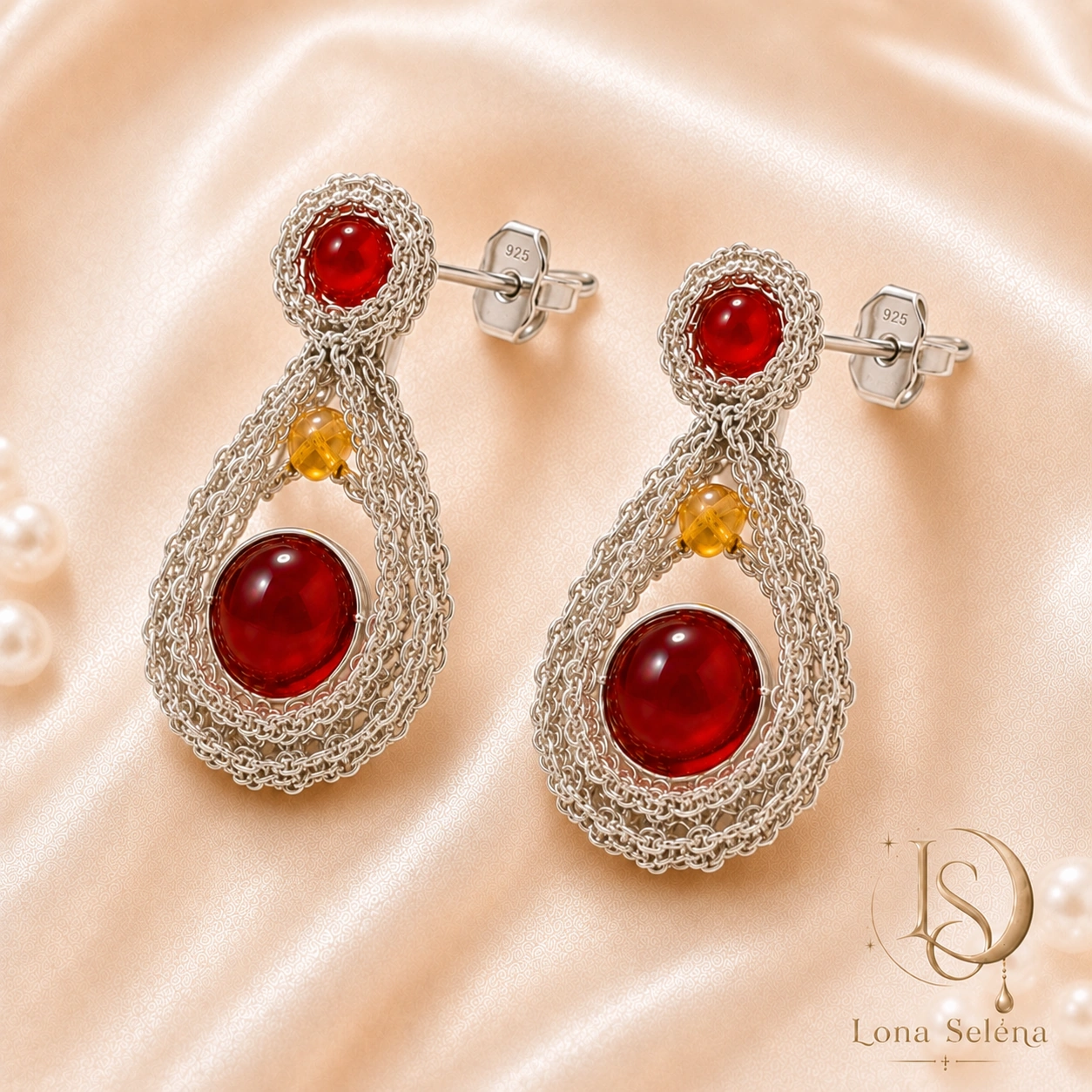 Handmade Lona Selena earrings with deep red stones and silver crochet detail